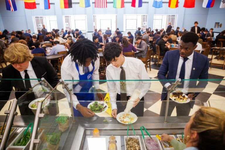 Several boys use the salad bar in the Kiski dining hall